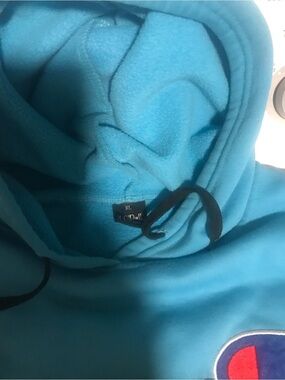 Supreme Turquoise Crewneck with Red and White Patch